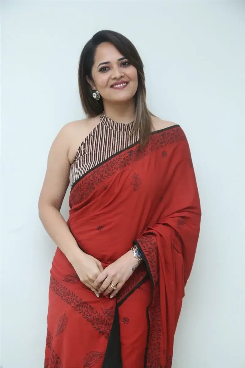 Hyderabad Girl Anasuya Bharadwaj in Red Saree at Movie Press Meet